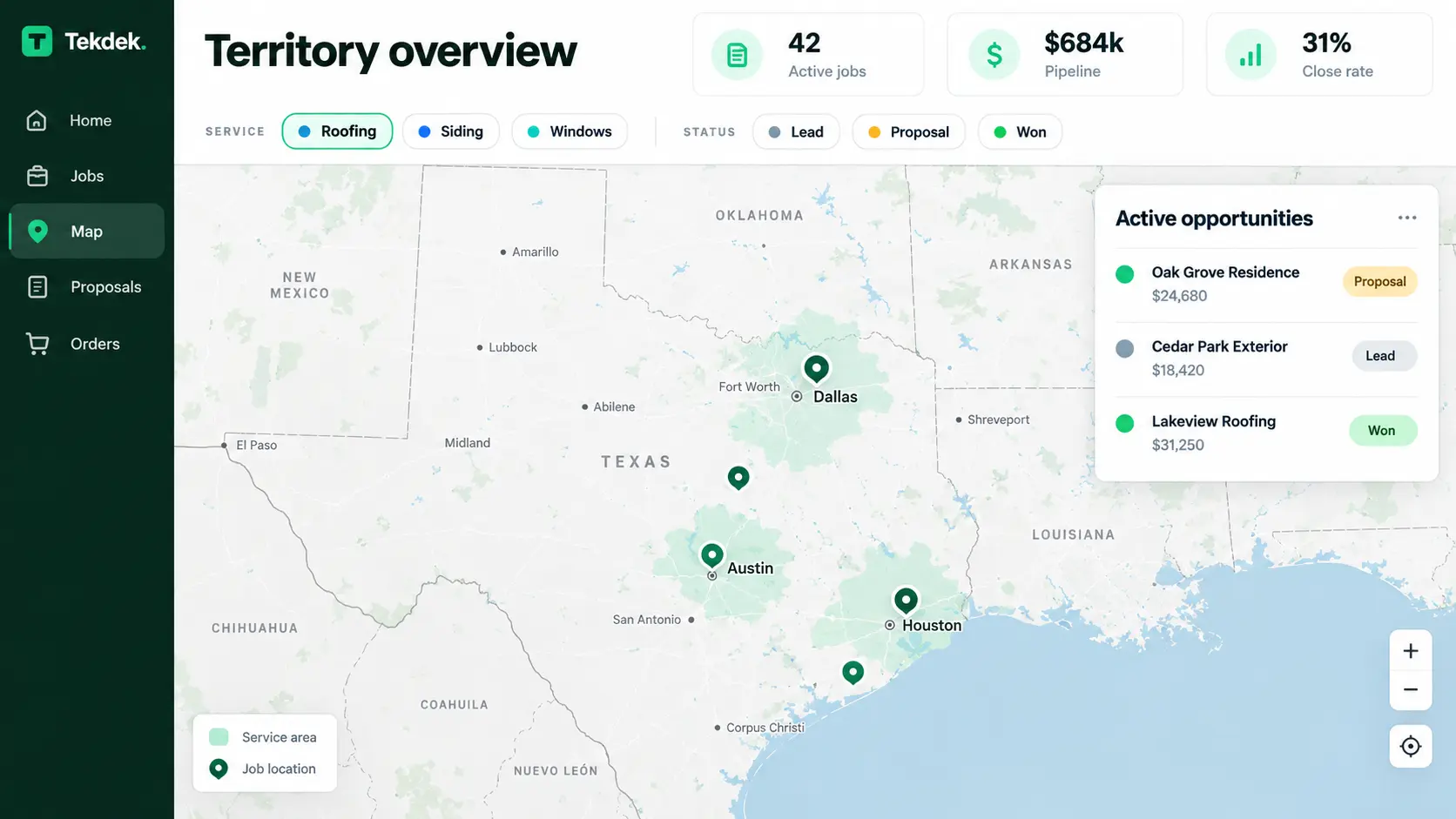 A territory overview with job locations on a map, shown on a laptop